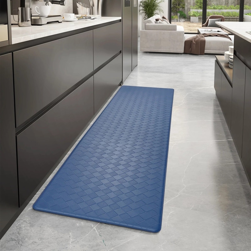 https://ak1.ostkcdn.com/images/products/is/images/direct/ca47eede64b6820bc7b9fa5183d607f2327ee22d/Kitchen-Rugs-Waterproof-Non-Slip-Comfort-Standing-Mat%2C17%22-x-71%22.jpg