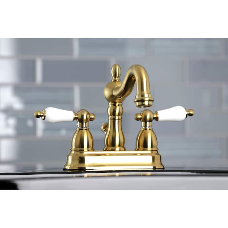 Kingston Brass Heritage Two-Handle 3-Hole Deck Mount 4 in. Centerset Bathroom Faucet - Brushed Brass