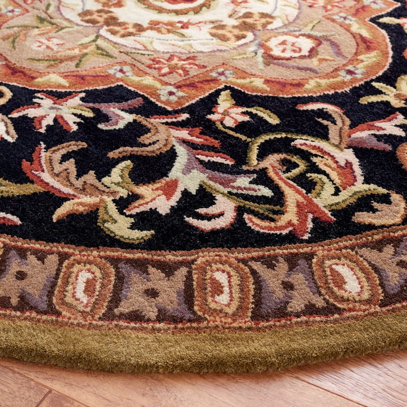 SAFAVIEH Handmade Classic Nidhi Traditional Oriental Wool Rug - 7'6" x 9'6" Oval - Black/Beige