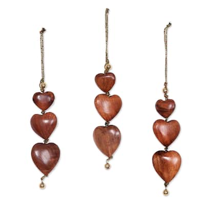 Handmade Joyous Hearts Wood Ornaments (India) - 5.5" H x 1.8" W x 0.8" D
