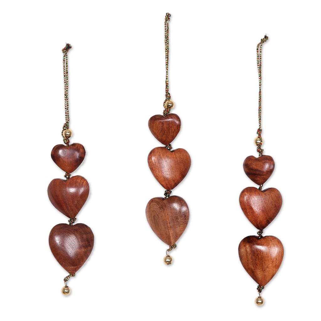 Handmade Joyous Hearts Wood Ornaments (India) - 5.5" H x 1.8" W x 0.8" D