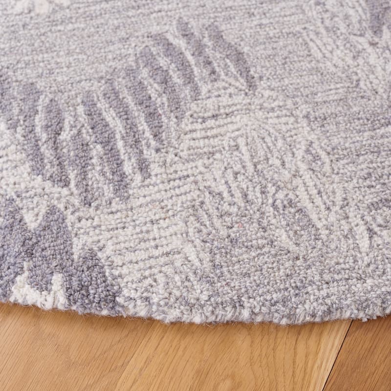 SAFAVIEH Handmade Ikat Engeltje Bohemian Wool Rug