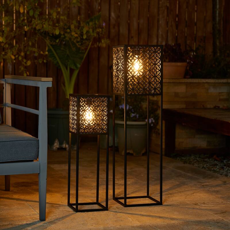 Glitzhome Set of 2 Black Metal Cutout Pattern Solar Powered Edison Bulb Outdoor Floor Lantern or Planter Stands - Black - 32"H & 22.25"H