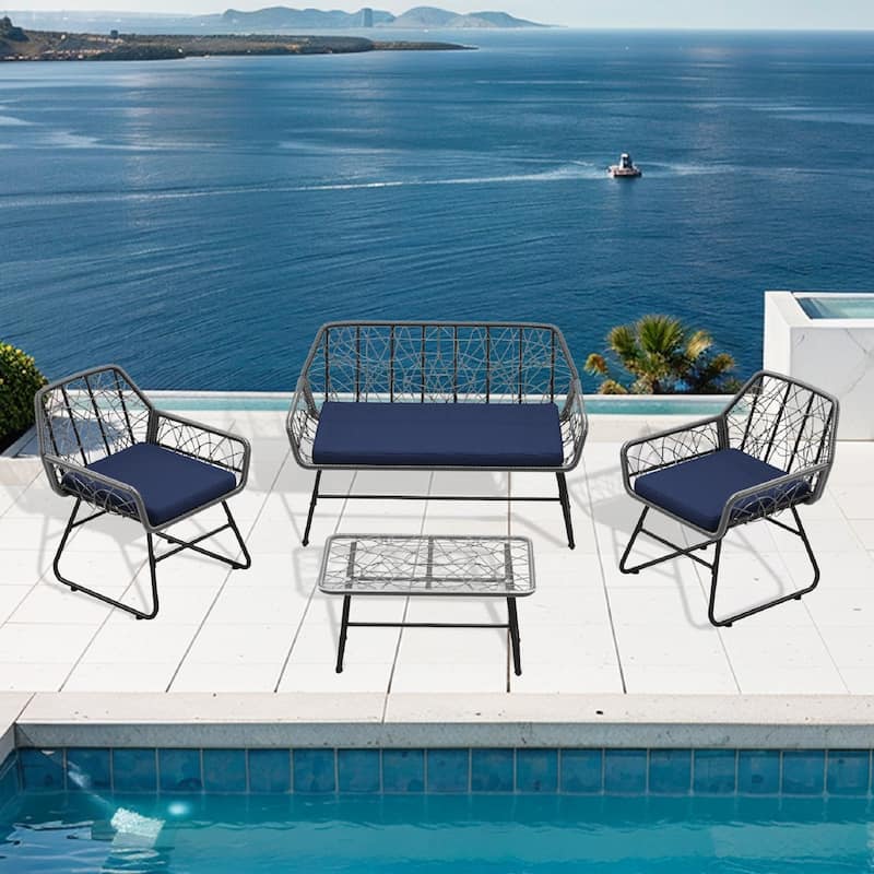 4-piece wicker patio furniture set with tempered glass table, detachable blue cushion cover for easy cleaning,Suitable f