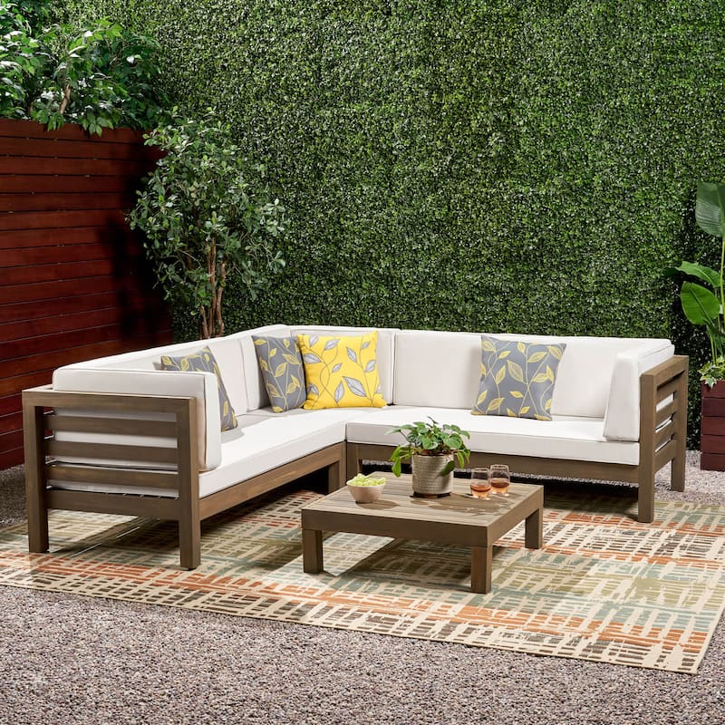 Oana Outdoor 5 Seater V Shaped Mid-Century Modern Acacia Wood Sectional Sofa Set with Coffee Table by Christopher Knight Home - White