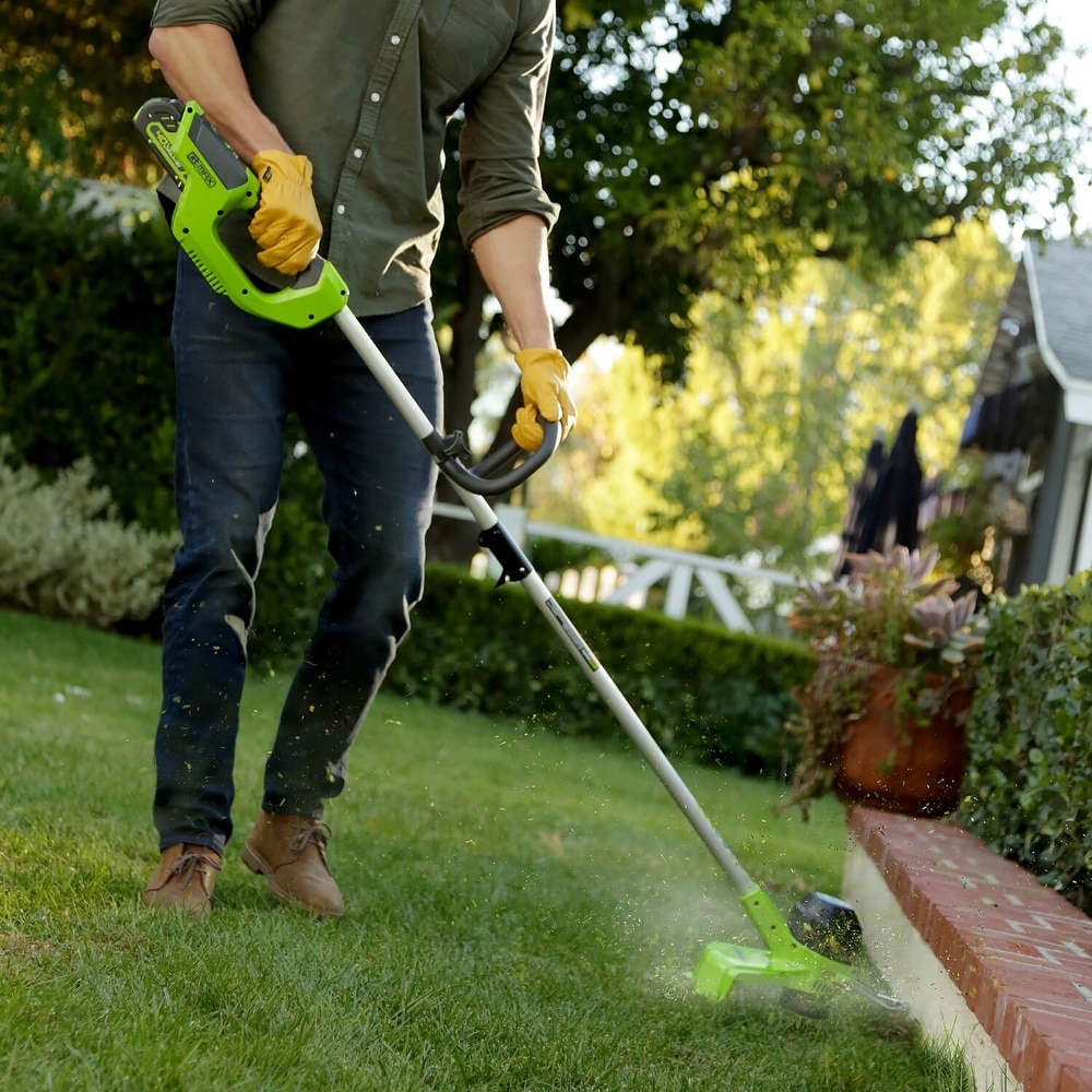 https://ak1.ostkcdn.com/images/products/is/images/direct/cb02fe2ebce7994443e8550fd550dbaabd5e7b9f/12-inch-String-Trimmer-W--2.0-Ah-Battery.jpg