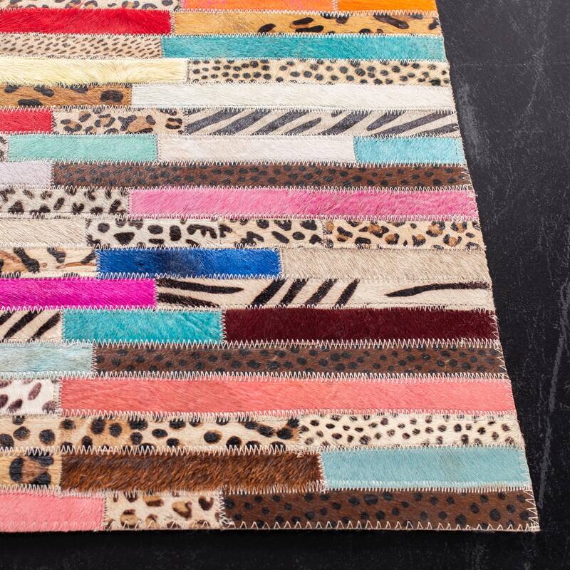 SAFAVIEH Handmade Studio Leather Cherish Natural Hide Leather Rug