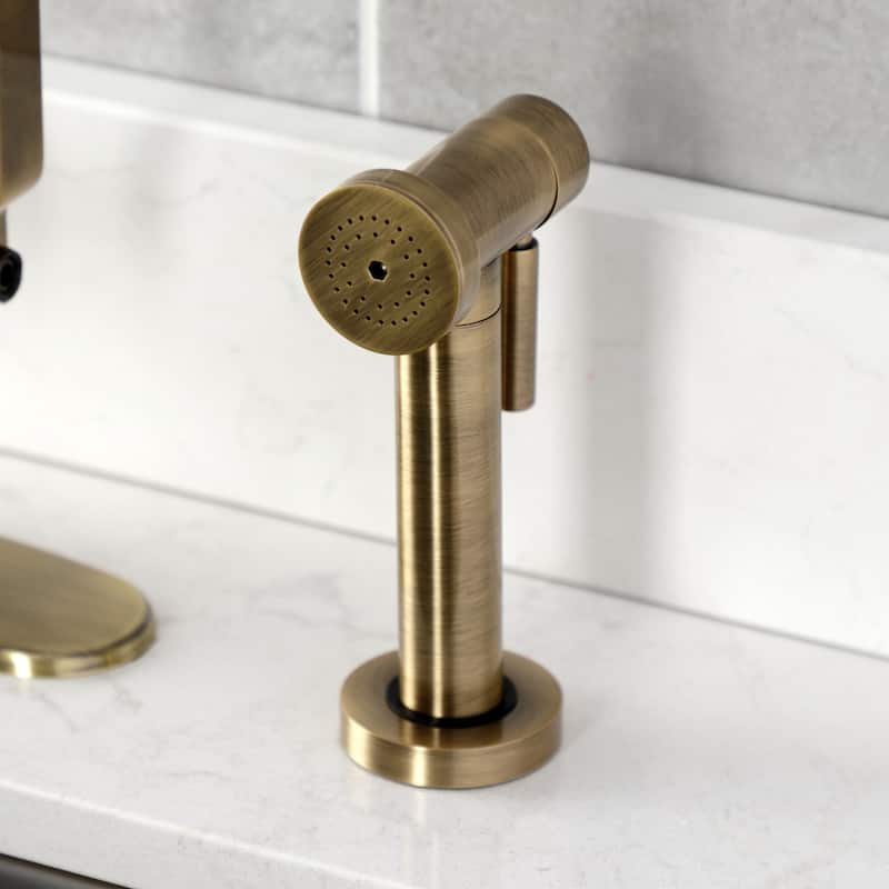 Kingston Brass Whitaker Single-Handle Deck Mount Kitchen Faucet with Brass Sprayer