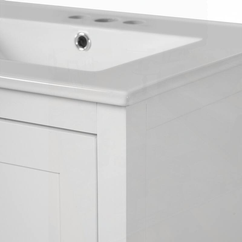 bathroom vanity with integrated undermount basin and a storage cabinet featuring 2 doors and 1 drawer