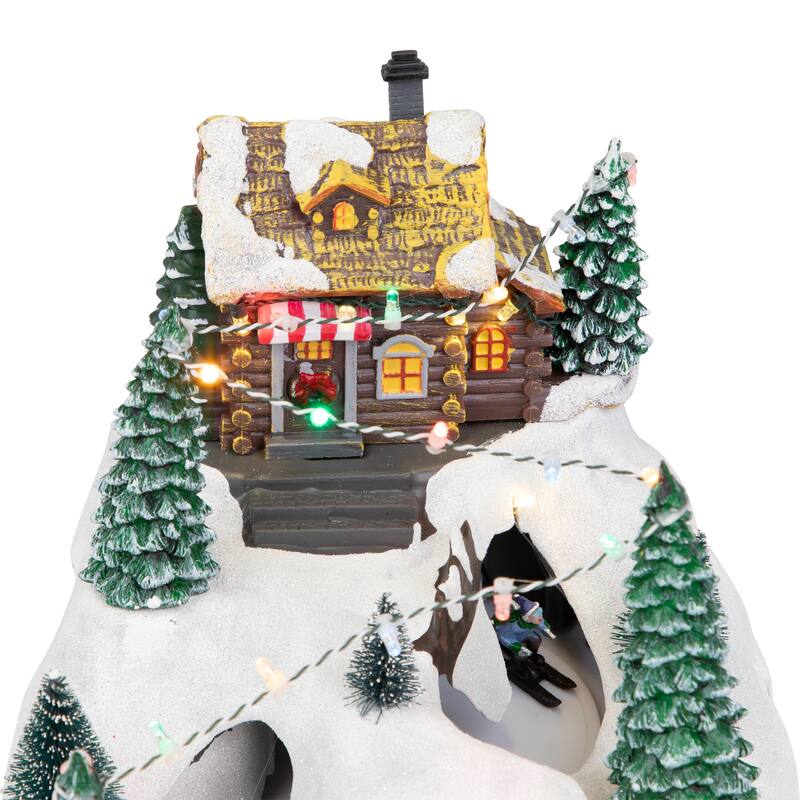 15" LED Lighted Winter Skiing Scene Animated Christmas Village Display