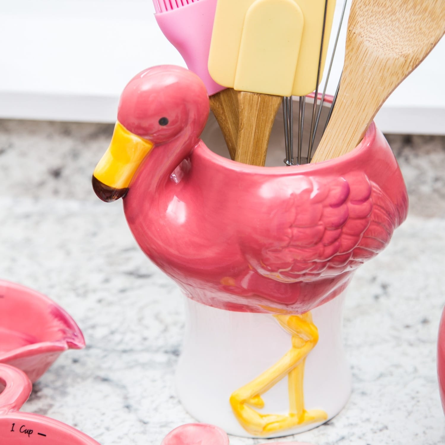 https://ak1.ostkcdn.com/images/products/is/images/direct/cb4f69215622e80cfac19df76fc2825525832da6/Pretty-in-Pink-Flamingo-Utensil-Crock-Kitchen-Counter-Decor-Ceramic.jpg