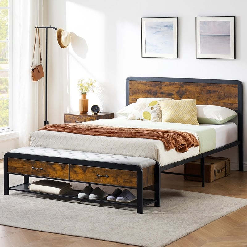 Wooden bed with drawers at the end of the bed