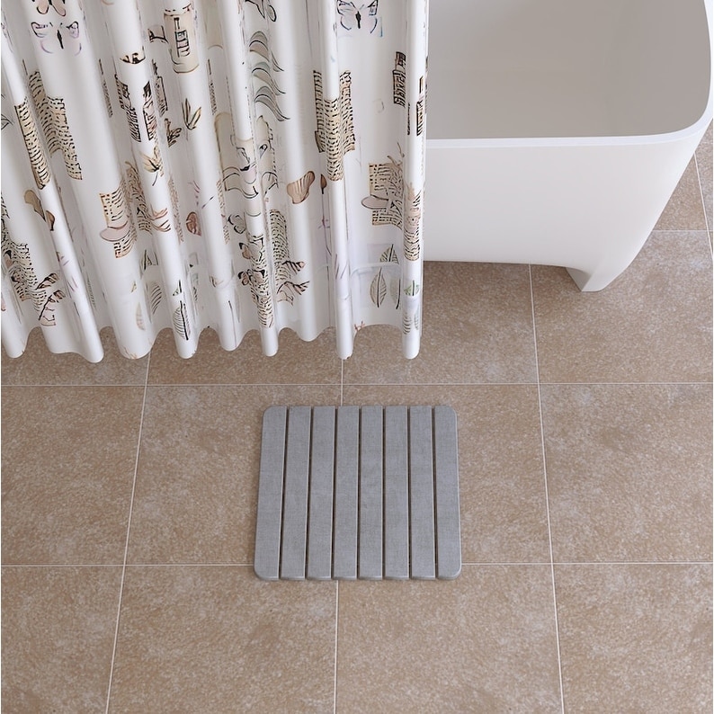 https://ak1.ostkcdn.com/images/products/is/images/direct/cb9f7eaf67df9795df12b3db7c9c6090b0294d6c/Quick-Drying-Diatomite-Stone-Bath-Mat.jpg
