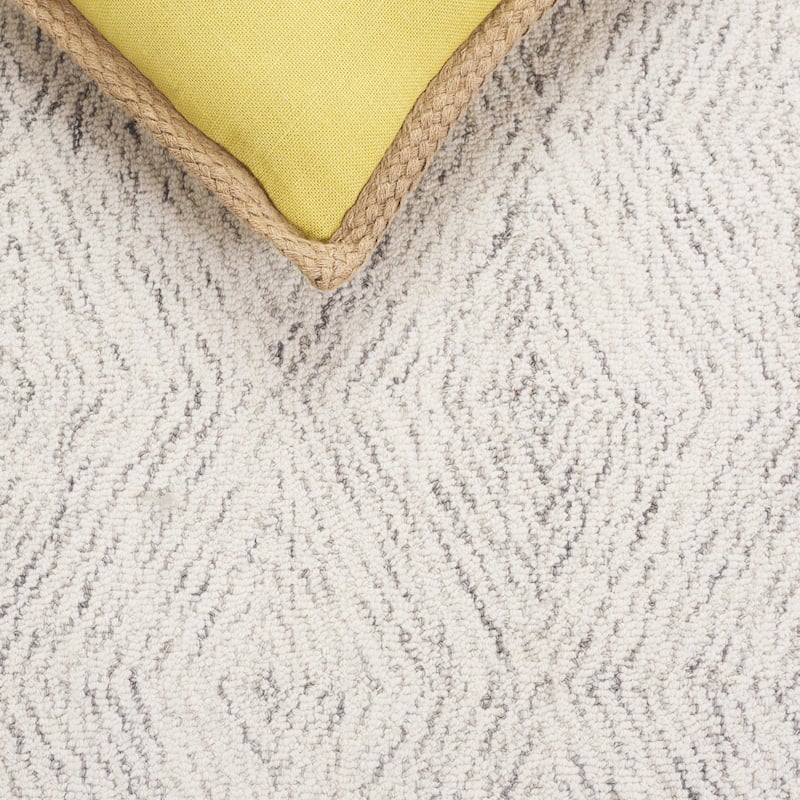 SAFAVIEH Handmade Ebony Herlaug Modern Wool Rug