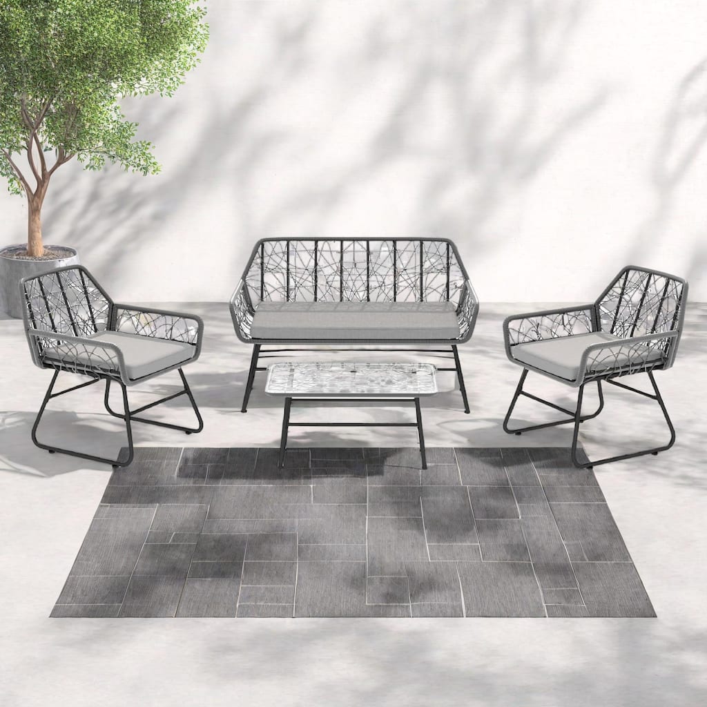 4-Piece Outdoor Woven Rattan Cnversation Sofa Set with Tempered Glass Coffee Table and Waterproof Cushions