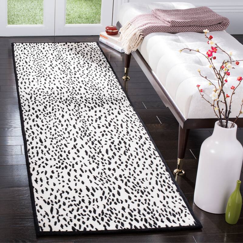 SAFAVIEH Handmade Marbella Goril Modern Polyester Rug