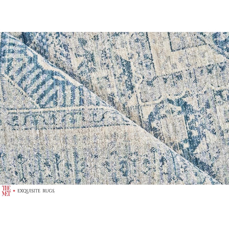 The Met X Exquisite Rugs Vintage Looms Light Blue/Blue Area Rug.