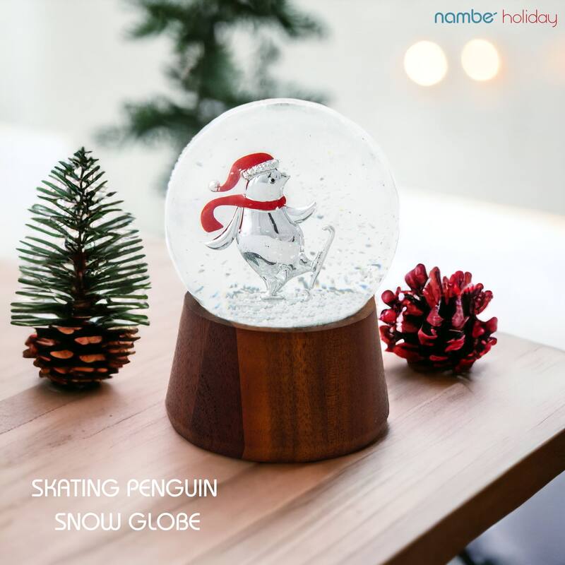 Nambe Skating Penguin Snow Globe - 5.25"H x 3.7"D