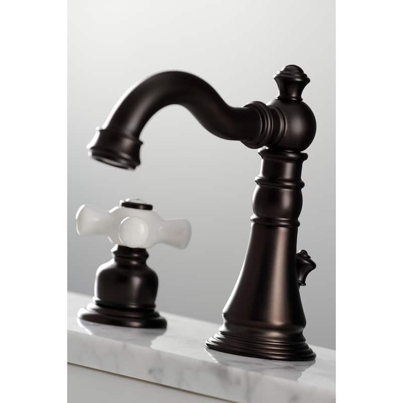 Kingston Brass American Classic Two-Handle 3-Hole Deck Mount Widespread Bathroom Faucet with Pop-Up Drain
