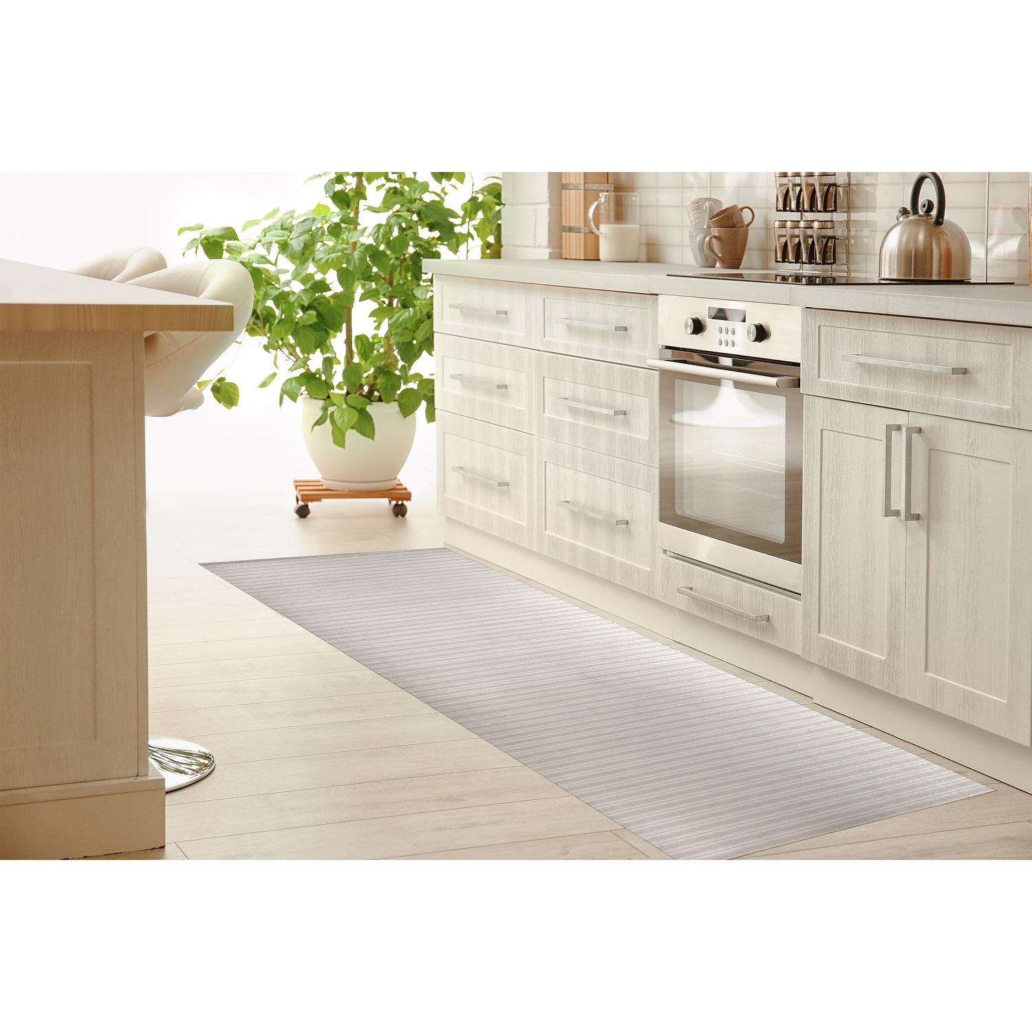https://ak1.ostkcdn.com/images/products/is/images/direct/cca4ec1a76e303a1196fd32a233721ae729efc66/CLASSIC-STRIPE-BEIGE-SMALL-SCALE-Kitchen-Mat-by-Kavka-Designs.jpg