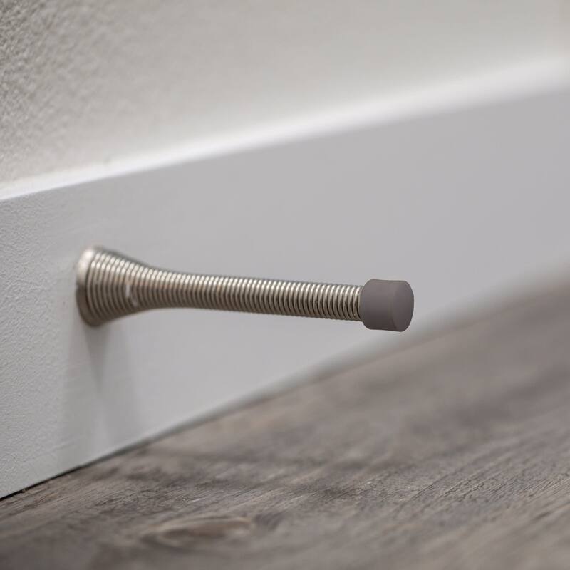 Design House 188284 3-1/8" Baseboard Mounted Spring Door Stop