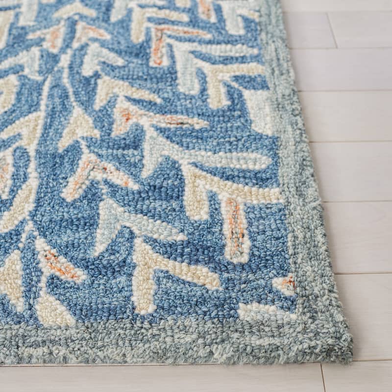 SAFAVIEH Handmade Capri Ilianka Wool Rug