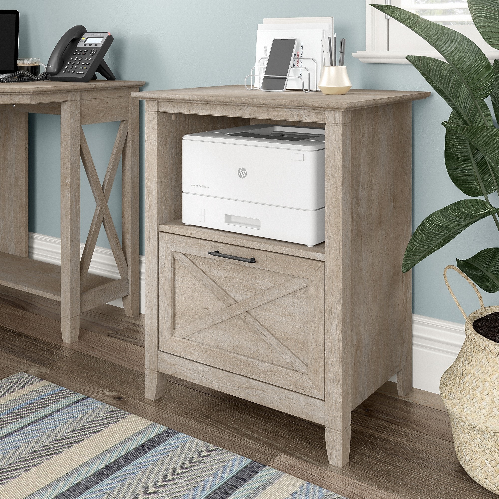 https://ak1.ostkcdn.com/images/products/is/images/direct/cd01d6b42e2fa39bd6a836ef02487043fd2d8cdc/Key-West-Lateral-File-Cabinet-with-Shelf-by-Bush-Furniture.jpg