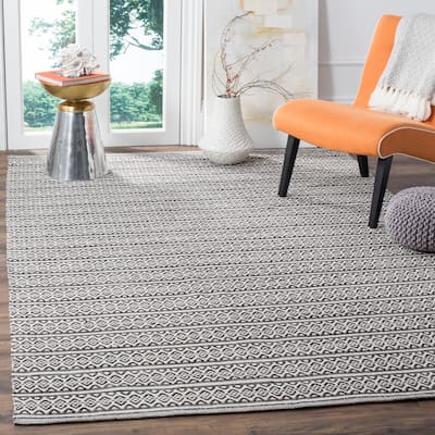 SAFAVIEH Handmade Flatweave Montauk Laetitia Cotton Rug - Ivory/Black - 6' x 9'