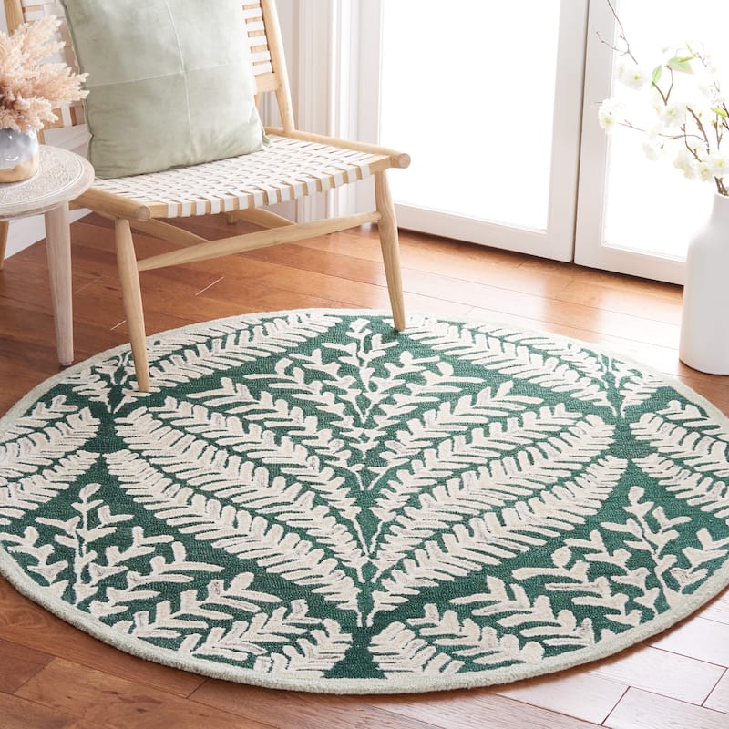 SAFAVIEH Handmade Capri Ilianka Wool Rug - 5' Round - Dark Green/Ivory