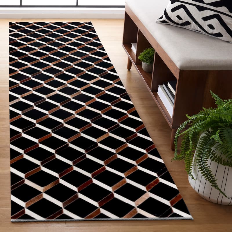 SAFAVIEH Handmade Studio Leather Nikia Mid-Century Modern Rug