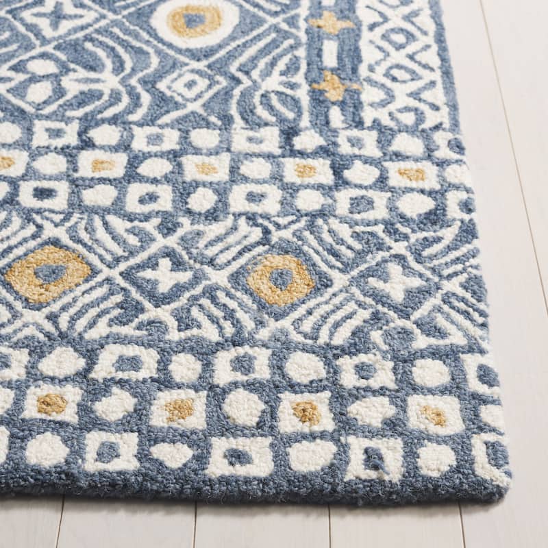 SAFAVIEH Handmade Micro-Loop Reglind Wool Rug