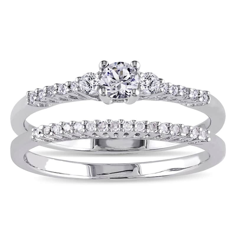 Miadora Sterling Silver Created White Sapphire and 1/10ct TDW Diamond 3-Stone Wedding Ring Set