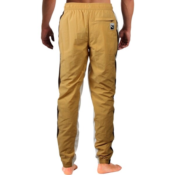 mustard track pants