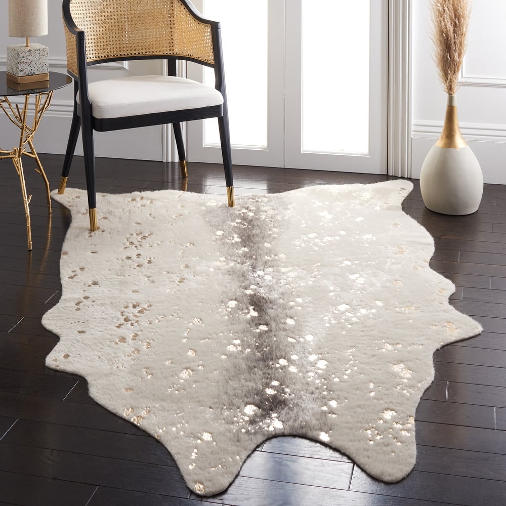 SAFAVIEH Faux Cow Hide Rassima Animal Rug