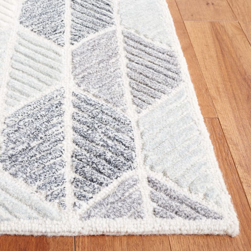 SAFAVIEH Handmade Ebony Sidonie Modern Wool Rug