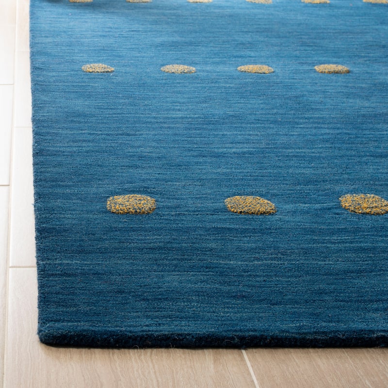 SAFAVIEH Handmade Himalaya Brittni Modern Wool Rug