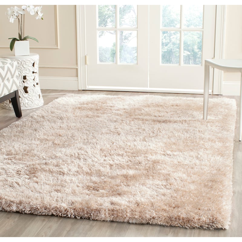 SAFAVIEH Handmade South Beach Leonella Shag Solid Polyester Rug - 8' x 10' - Champagne