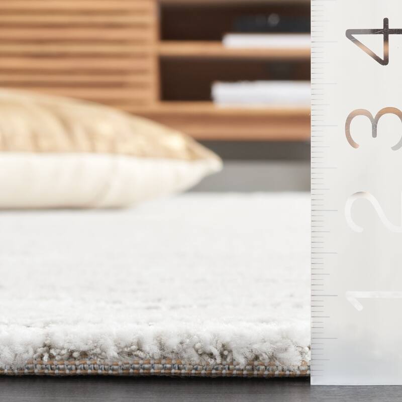 SAFAVIEH Neptune Orra Contemporary Rug.