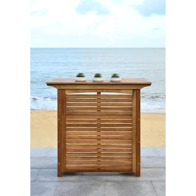 SAFAVIEH Outdoor Monterey Wood 3-Shelf Bar Table. - 27" W x 46" D x 42" H