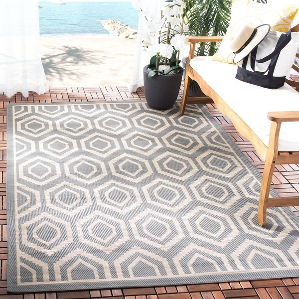 SAFAVIEH Courtyard Carolee Indoor/ Outdoor Patio Backyard Rug. Opens flyout.