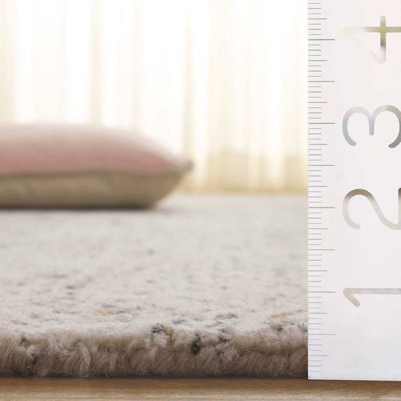 SAFAVIEH Handmade Ebony Herlaug Modern Wool Rug