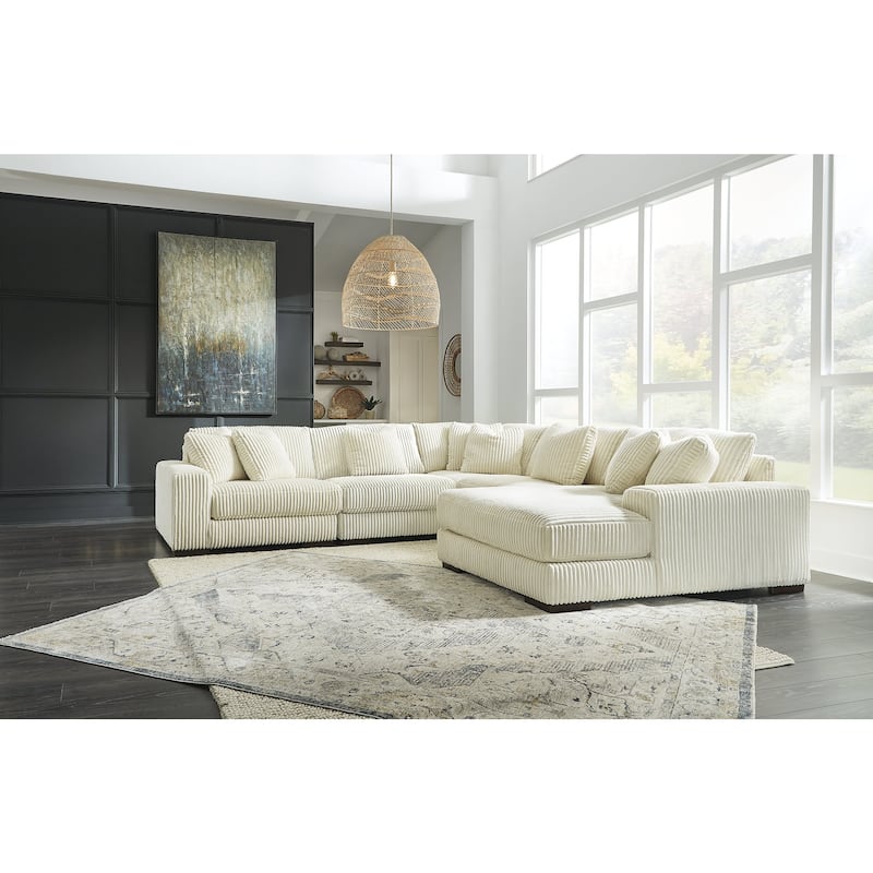 Signature Design by Ashley Lindyn 5-Piece Sectional with Chaise - 133"W x 133"D x 38"H - Ivory - Left Facing