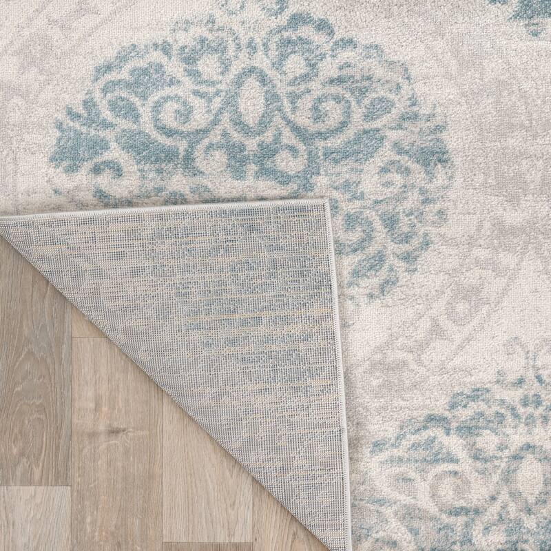 Porch & Den Pascuzzi Distressed Floral Damask Area Rug