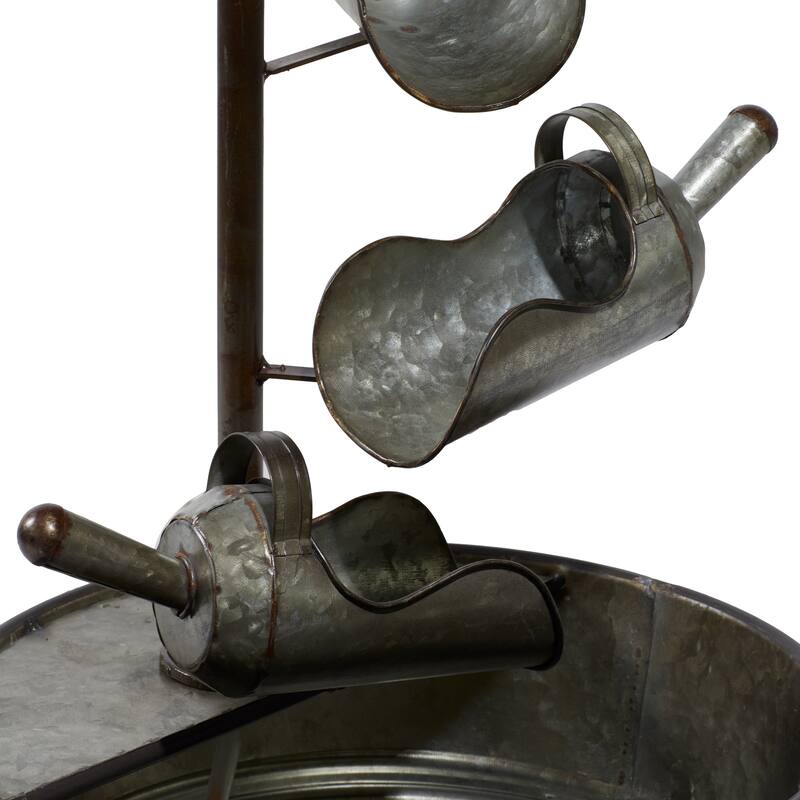 Gray Metal Fountain with Watering Cans