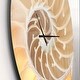 preview thumbnail 3 of 8, Designart 'Golden Nautilus Shell Pattern' Oversized Coastal Wall CLock