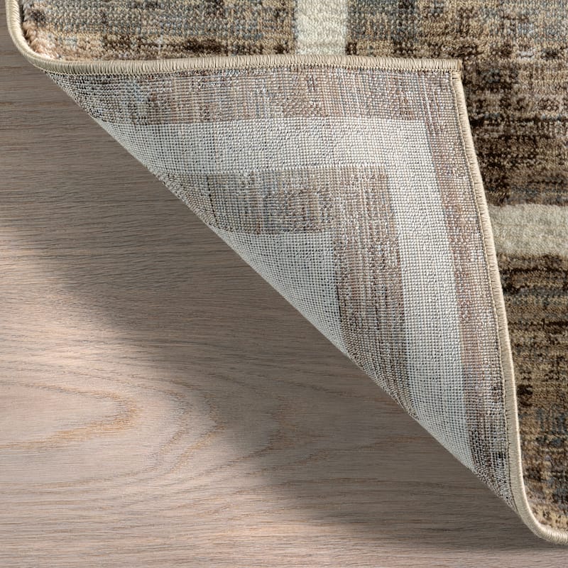 Olvera Geometric Bordered Area Rug