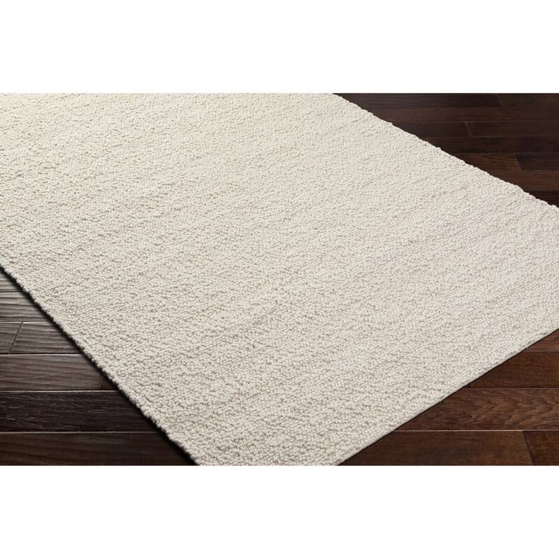 Juwan Mid-Century Modern Solid Area Rug