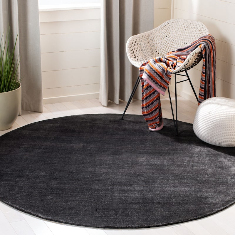 SAFAVIEH Handmade Himalaya Jessika Modern Wool Rug - 8' Round - Black - Round