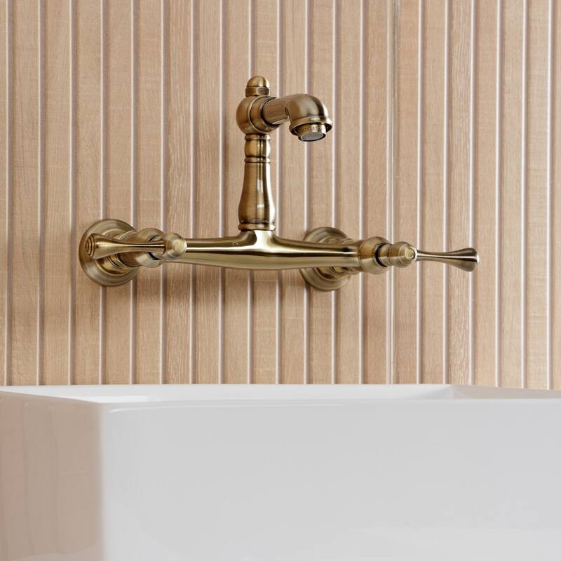 Kingston Brass English Country Two-Handle 2-Hole Wall Mount Bathroom Faucet