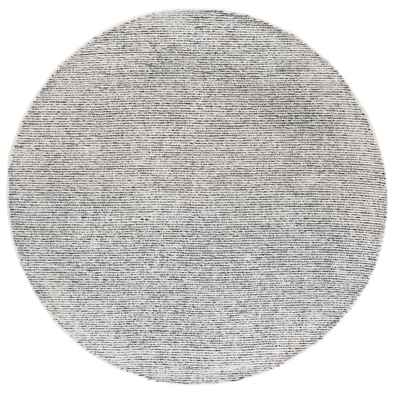 SAFAVIEH Handmade Abstract Rumena Contemporary Rug - 6' Round - Ivory/Black